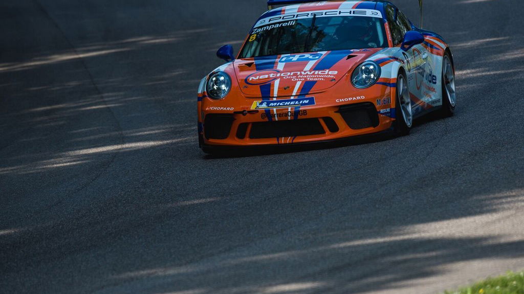 Zamparelli escapes pile-up to win opening Monza race